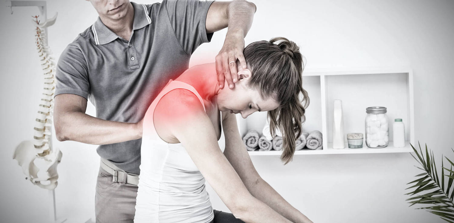 Chriopractor treating neck pain